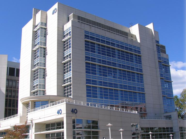 a white building with blue windows