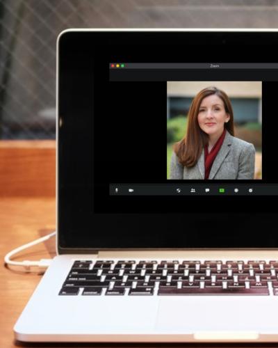 image of a woman on zoom on a laptop