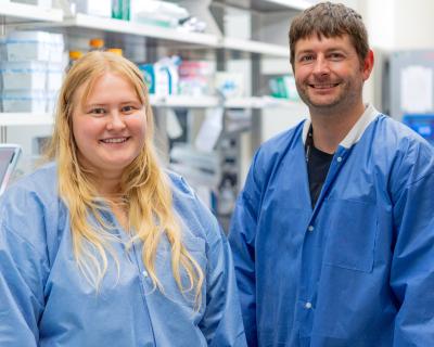 Hanna Anhalt and Kyle O'Donnell in a laboratory 