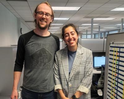 Rojin Najmabadi and Sean Mack in a laboratory