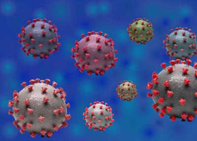 Differently colored virus particles on a speckled blue background.