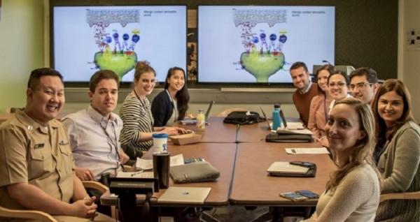 First- and second-year fellows attend a Friday Conference.