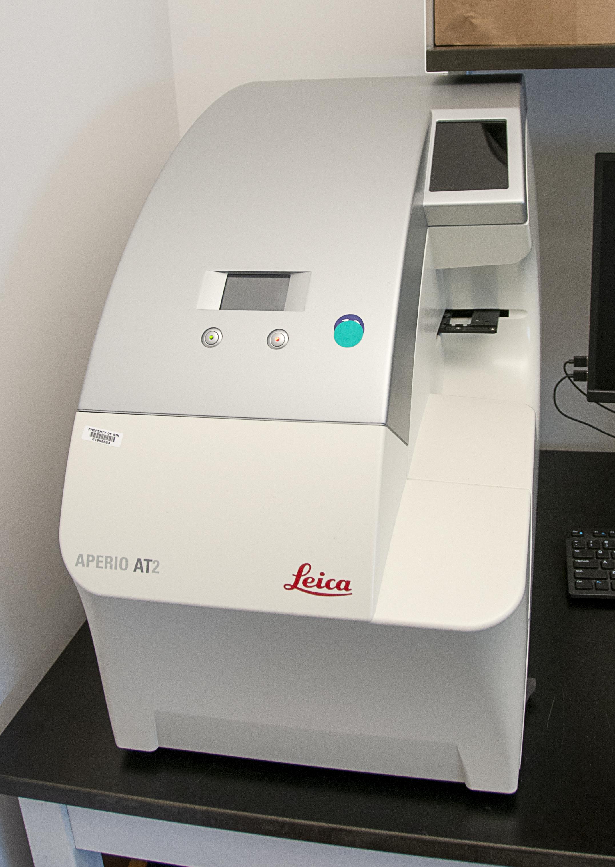 Leica Aperio AT2 high-throughput digital slide scanner.