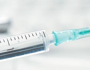 a vile and syringe