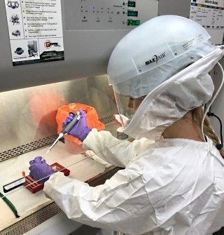 Photo of Carrie Long working in the laboratory