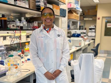 Lauryn Ridley standing at a lab bench